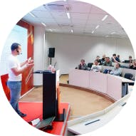 Expert is giving talk during conference